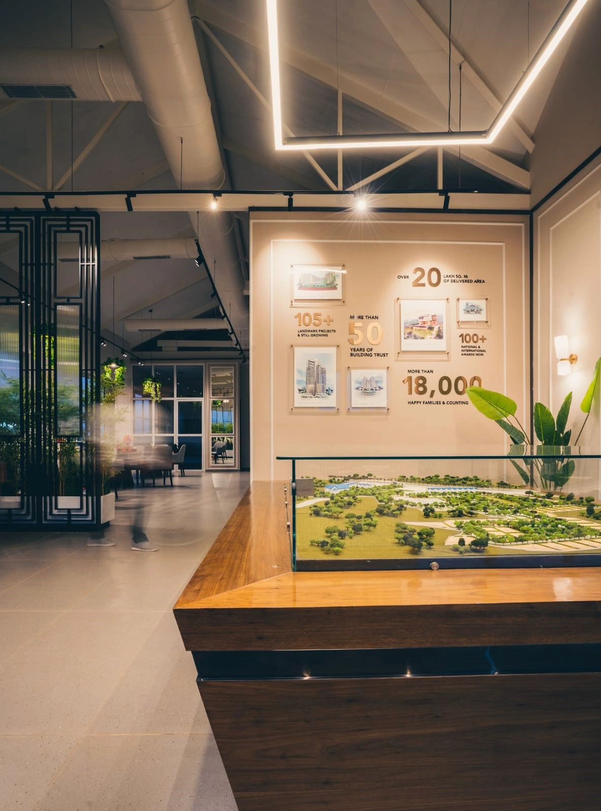 White interiors with natural light in real estate sales pavilion